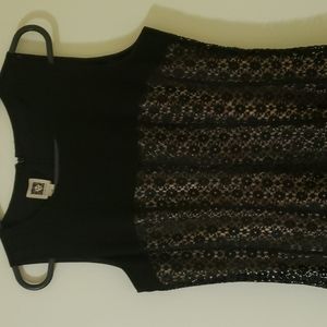 Black crepe and lace dress.